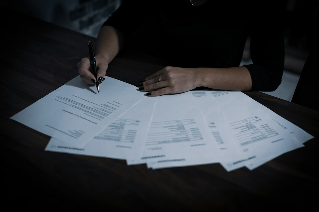 person reviewing insurance documents