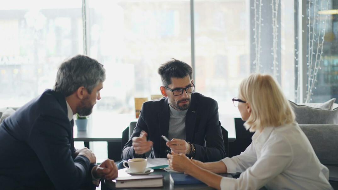 business people negotiating contract