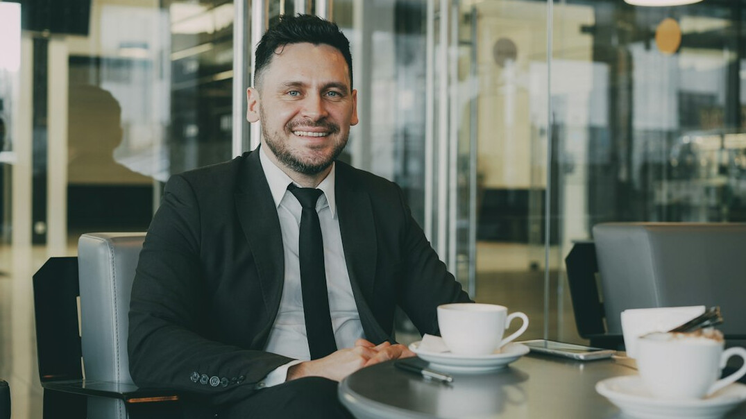 confident businessman smiling